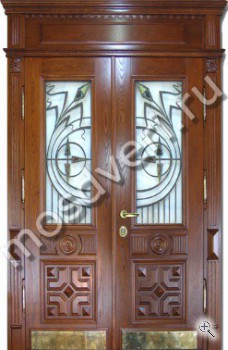 Эксклюзивная входная дверь с резьбой, стеклом и ковкой - купить от производителя Мосдвери Эксклюзивная входная дверь с резьбой, стеклом и ковкой